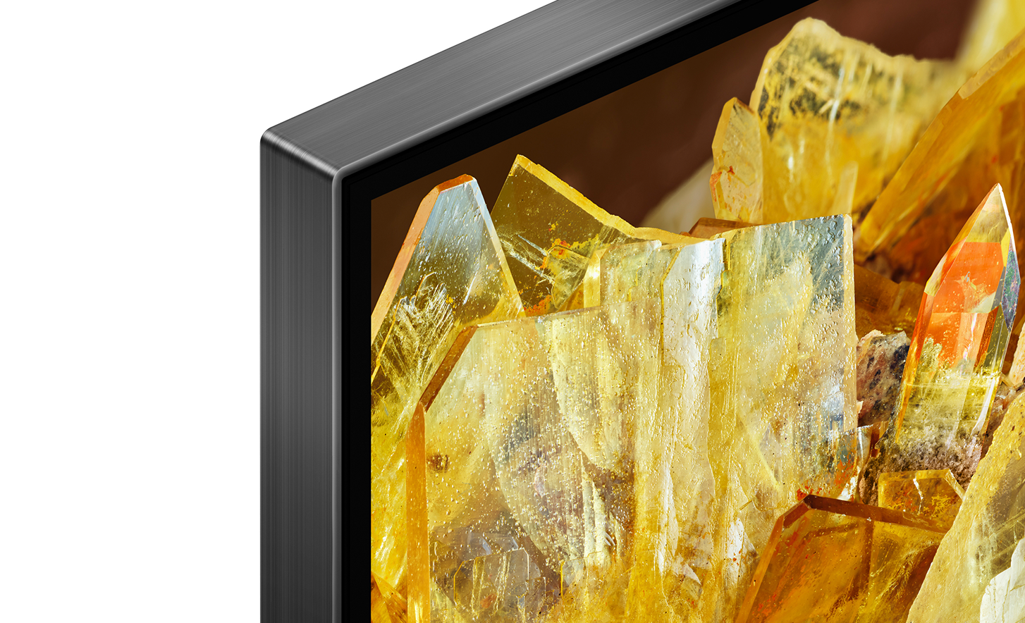 Esquina de un televisor con cristales dorados en pantalla